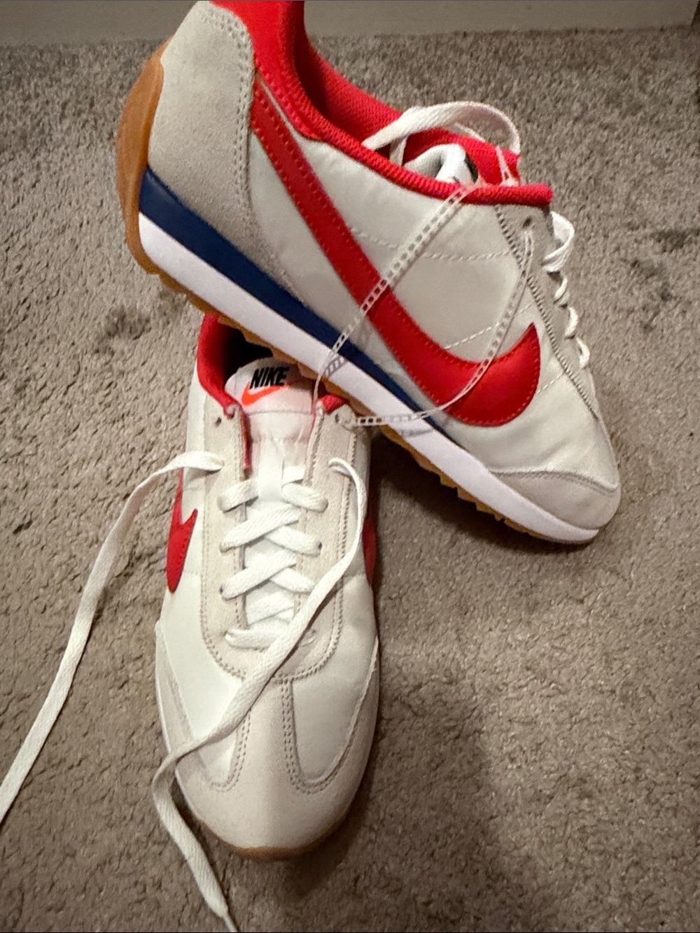 Nike White Sneakers with Red Swoosh and Red Lining